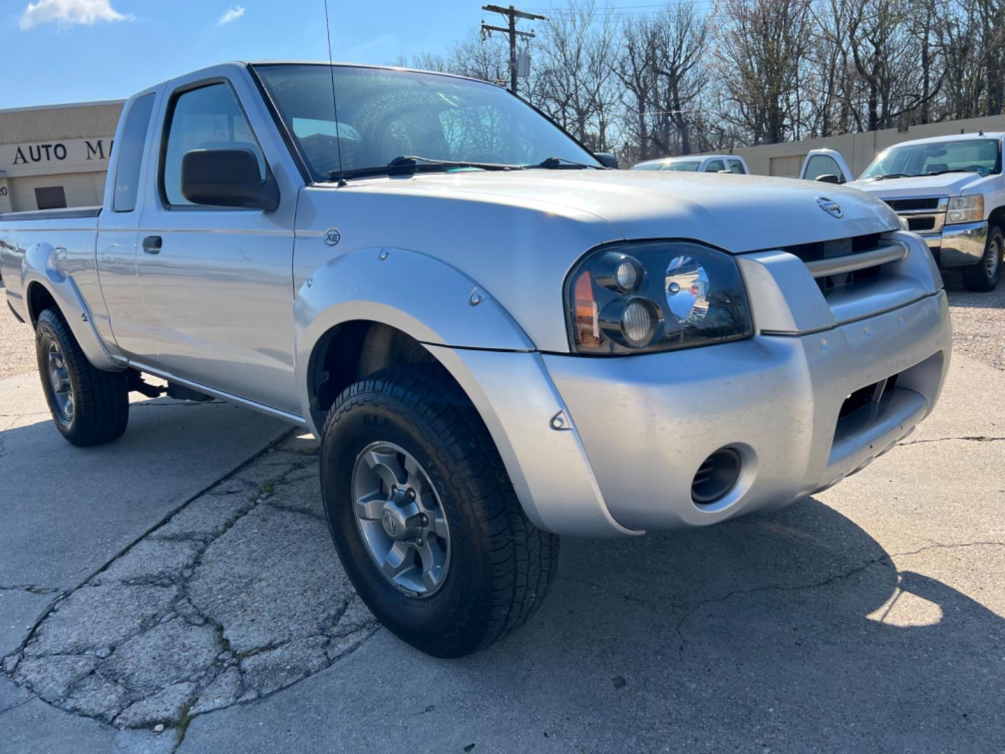 2004 Silver /Gray Nissan Frontier XE (1N6ED26T24C) with an V6 engine, Automatic transmission, located at 4520 Airline Hwy, Baton Rouge, LA, 70805, (225) 357-1497, 30.509325, -91.145432 - 2004 Nissan Frontier XE V6 Gas, 160K Miles, Power Windows & Locks Spray, Paint Chip On Drivers ExCab & Dent In Rear Bumper. NO IN HOUSE FINANCING. FOR INFO PLEASE CONTACT JEFF AT 225 357-1497 CHECK OUT OUR A+ RATING WITH THE BETTER BUSINESS BUREAU WE HAVE BEEN A FAMILY OWNED AND OPERATED BUSINESS A - Photo#3